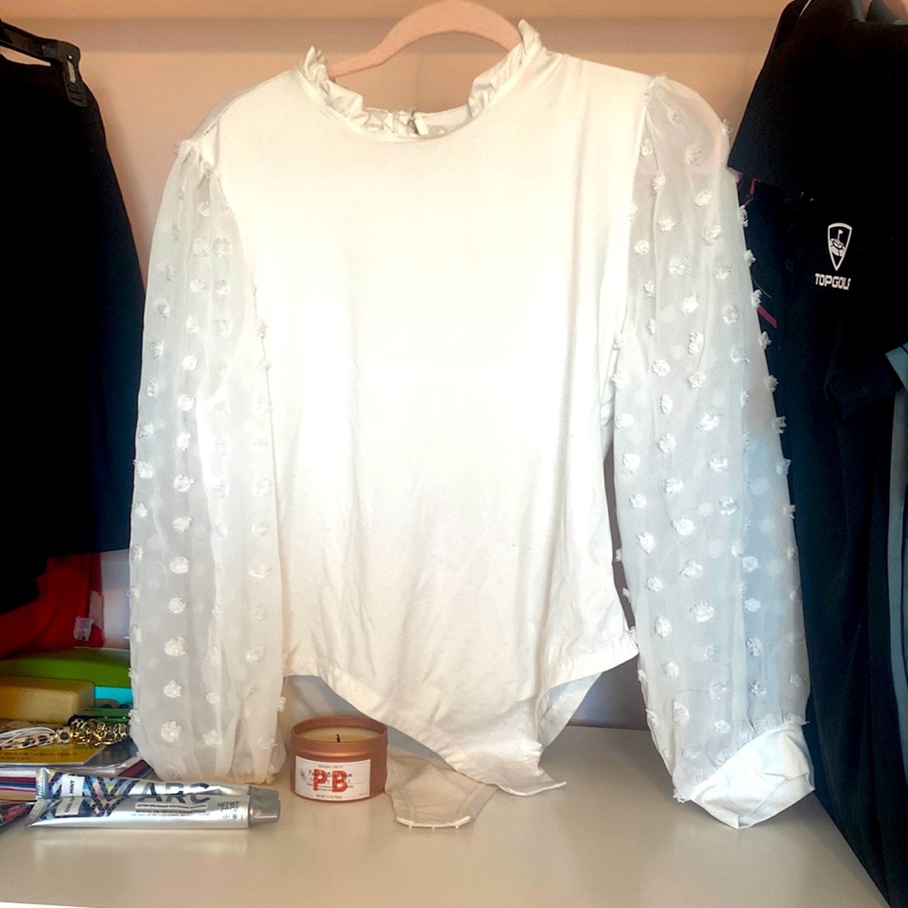 Super cute white bodysuit with see-through sleeves, worn once